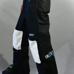 Black ski pants with white knee patches.