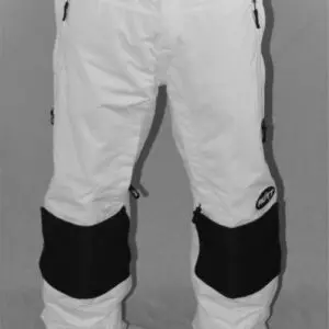 White ski pants with black knee patches.